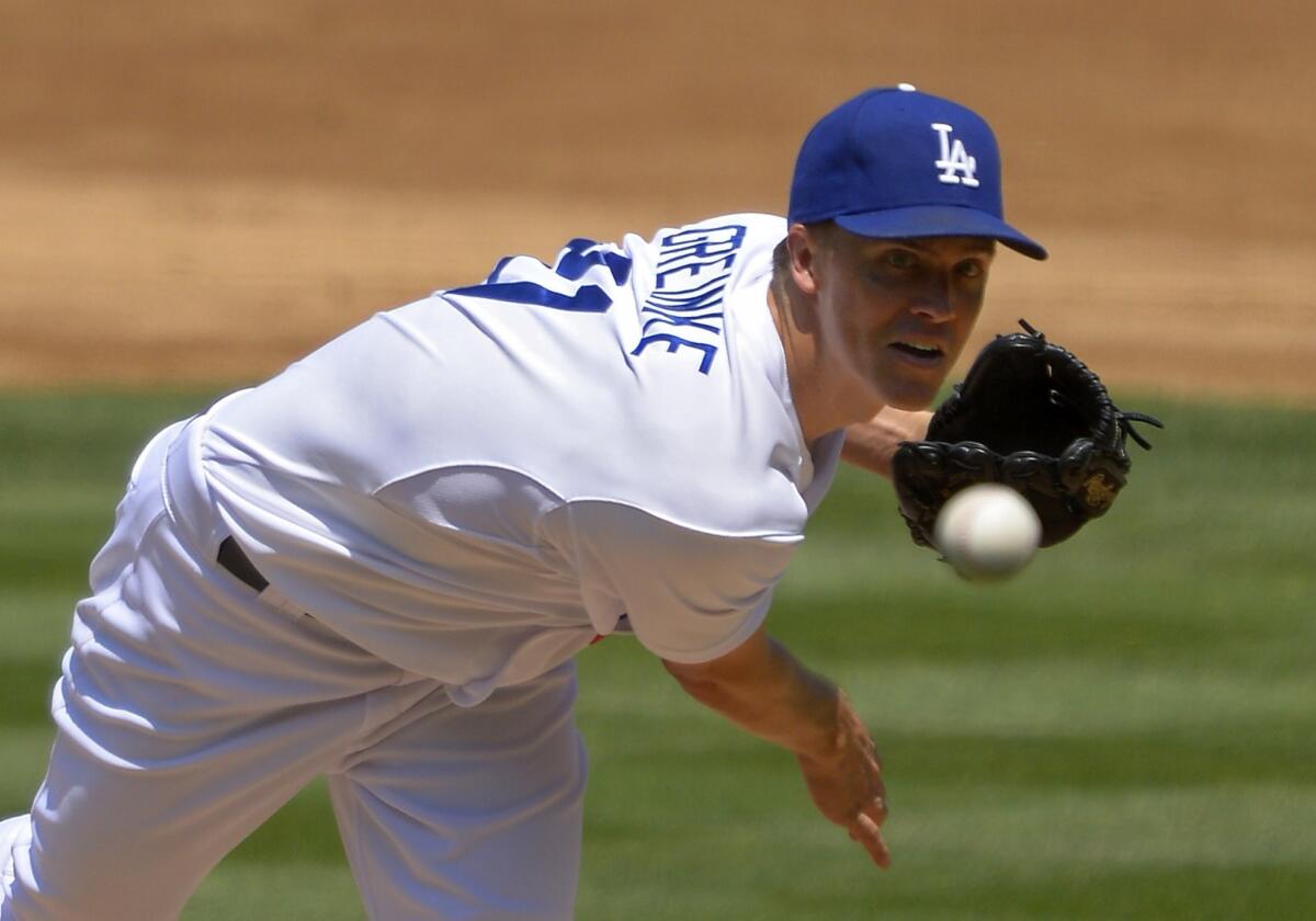 Dodgers starter Zack Greinke delivers a pitch during the Saturday's 5-0 victory over the Tampa Bay Rays.