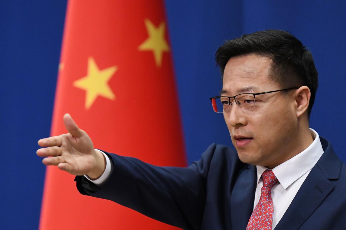Chinese Foreign Ministry spokesman Zhao Lijian takes a question at the daily media briefing in Beijing on April 8.