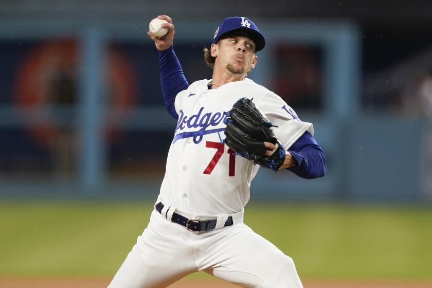 Los Angeles Dodgers starting pitcher Gavin Stone throws during the first inning.