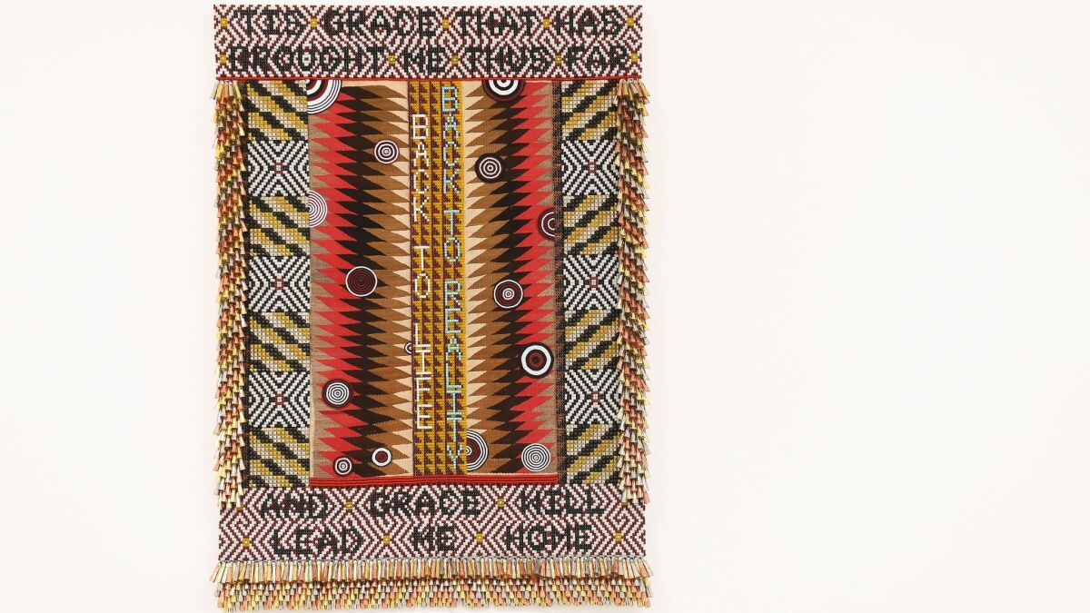 Jeffrey Gibson's "Amazing Grace," 2017, glass beads, artificial sinew, trading post weaving, steel studs, copper and tin jingles, acrylic felt, canvas, wood. 76 inches by 54 inches