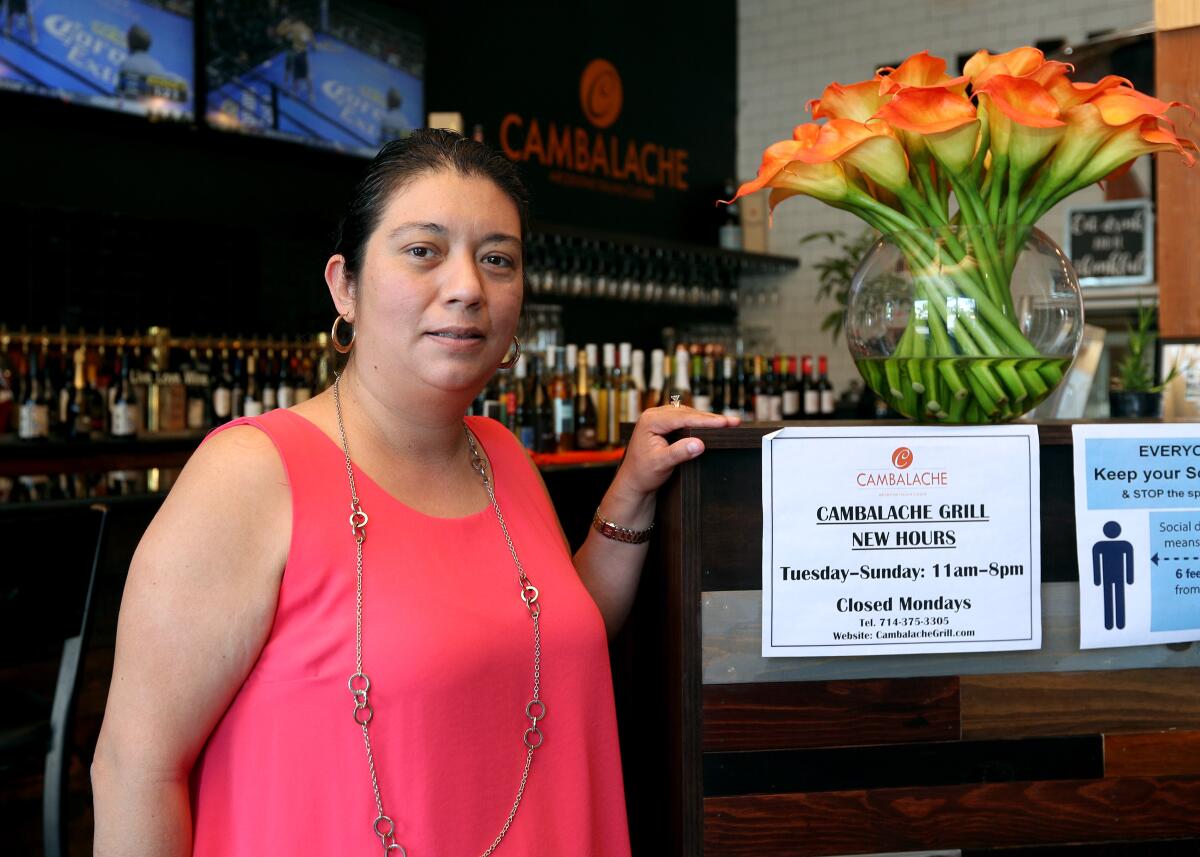 Teresa Razo, who is president of the Fountain Valley Restaurant Assn., at her restaurant on May 30.