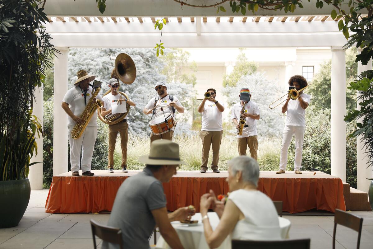 The Angel City All-Star Brass Band performs at The Huntington's centennial celebration in San Marino on Thursday, September 5, 2019. 