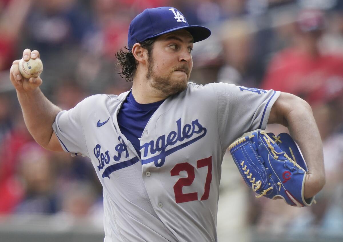 Los Angeles Dodgers starting pitcher Trevor Bauer (27) delivers.