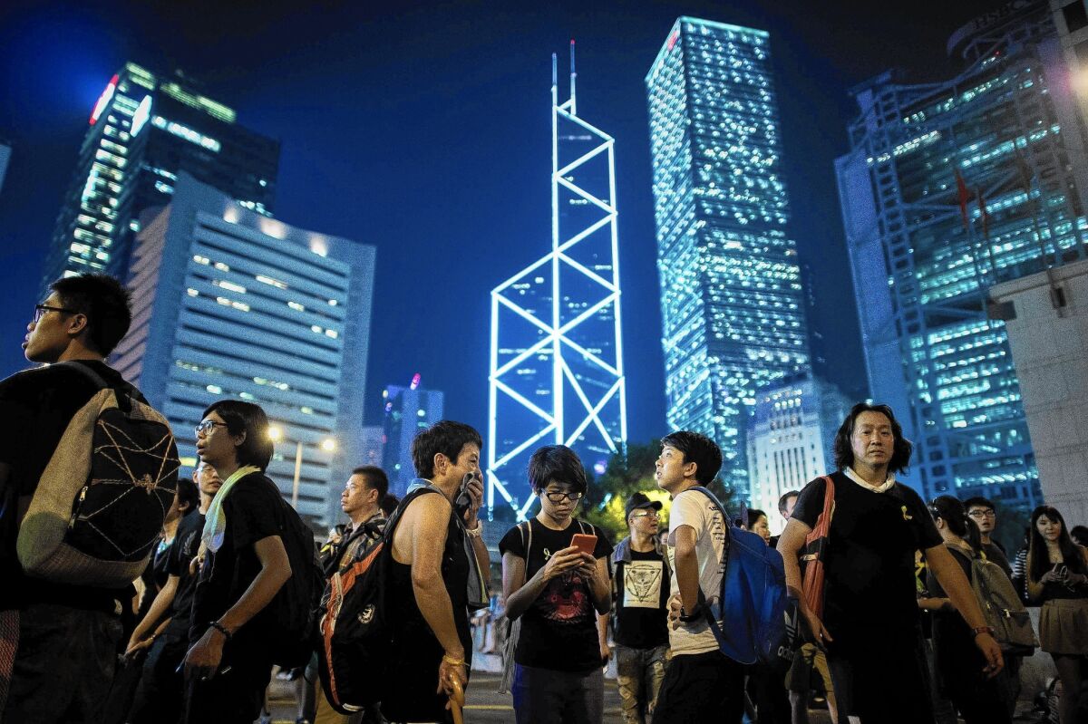 Demonstrators gather for a third night in the Central District, Hong Kong's financial hub, to demand free elections.