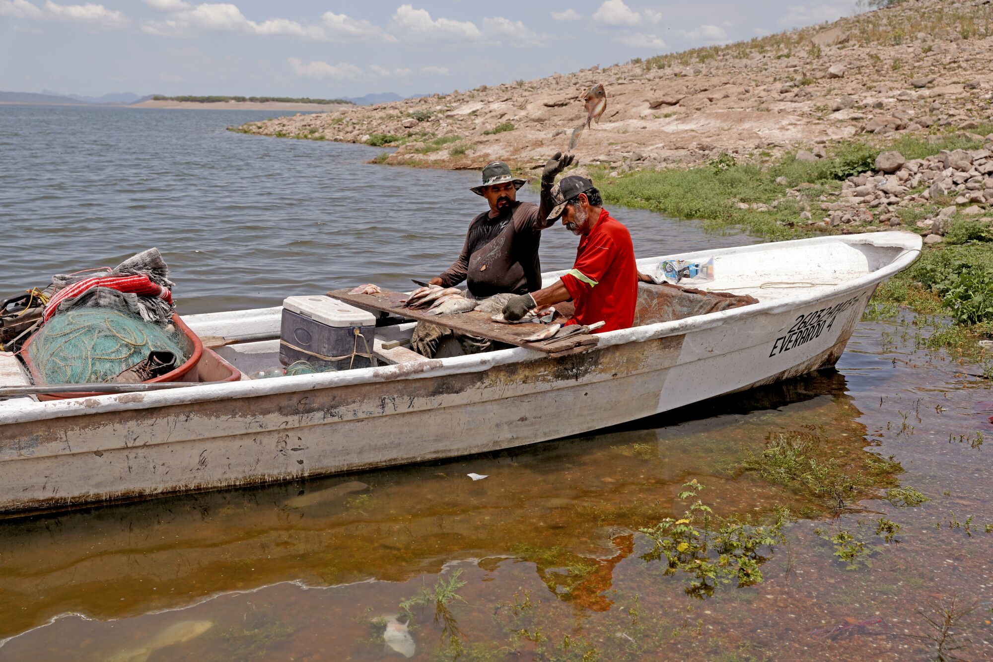 Fishermen on Agua Caliente reservoir