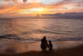 Sunset on the beach in the Kapalua resort area north of Lahaina in West Maui.