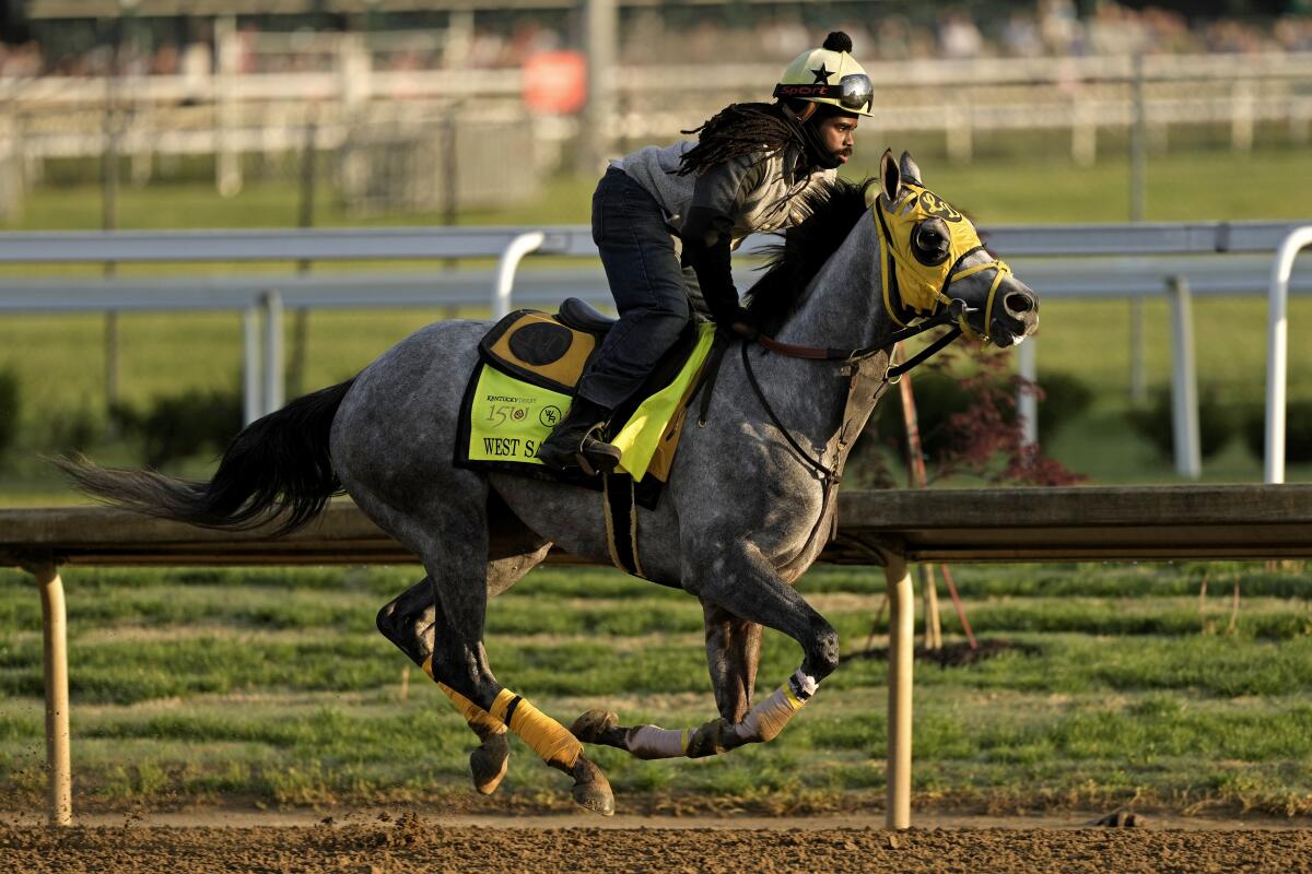 Kentucky Derby entrant West Saratoga works out at Churchill Downs 