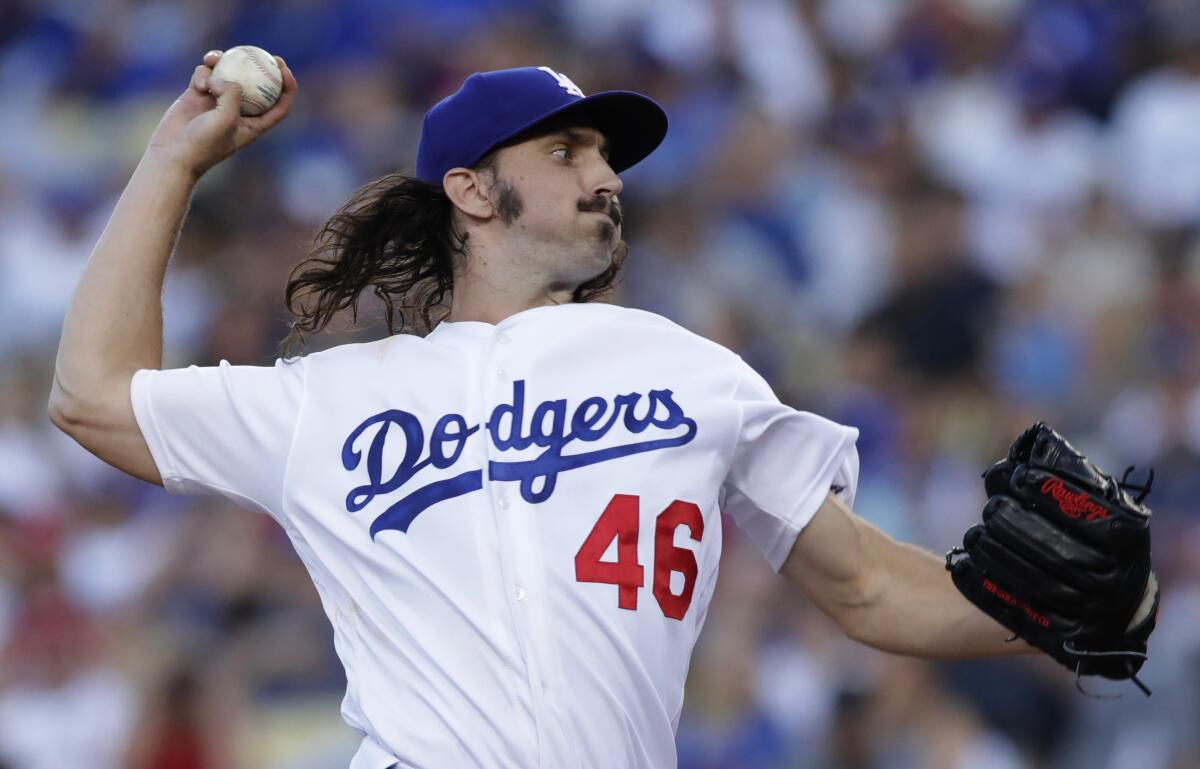 Tony Gonsolin, pictured, will start NLCS Game 2 against the Braves because of Clayton Kershaw's back spasms.