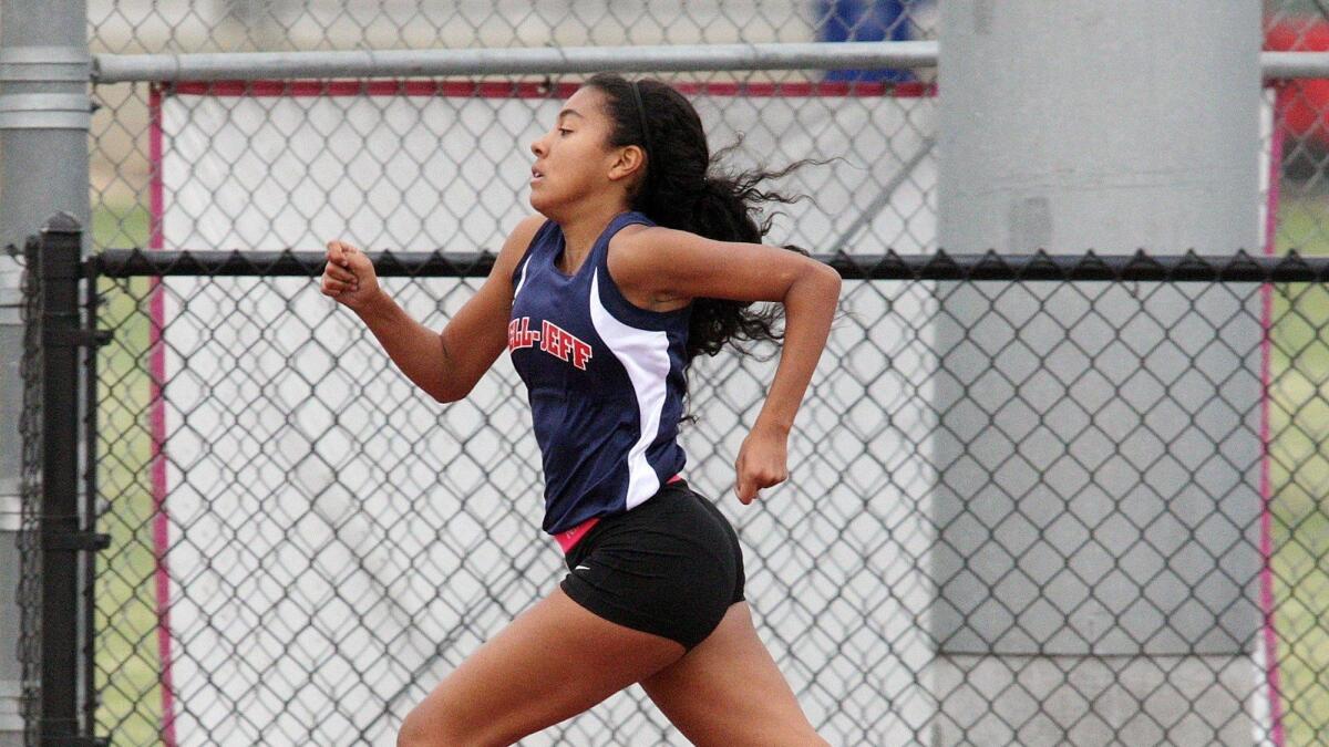 Bellarmine-Jefferson's Caitlyn Couch in the 400 meter in the five-team Santa Fe League finals at Burroughs High School on Memorial Field on Wednesday, May 6, 2015.