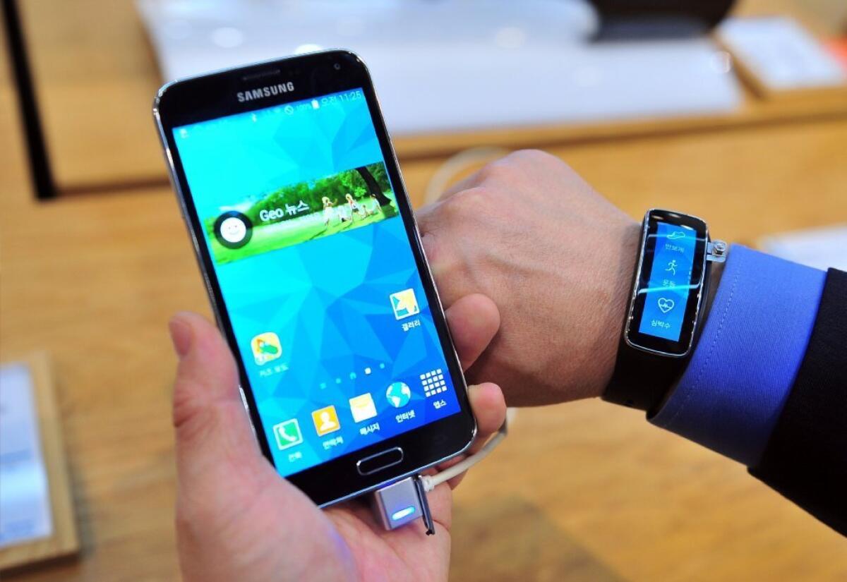 Large smartphones are becoming more popular. Above, Samsung's S5 smartphone, which boasts a 5.1-inch screen.
