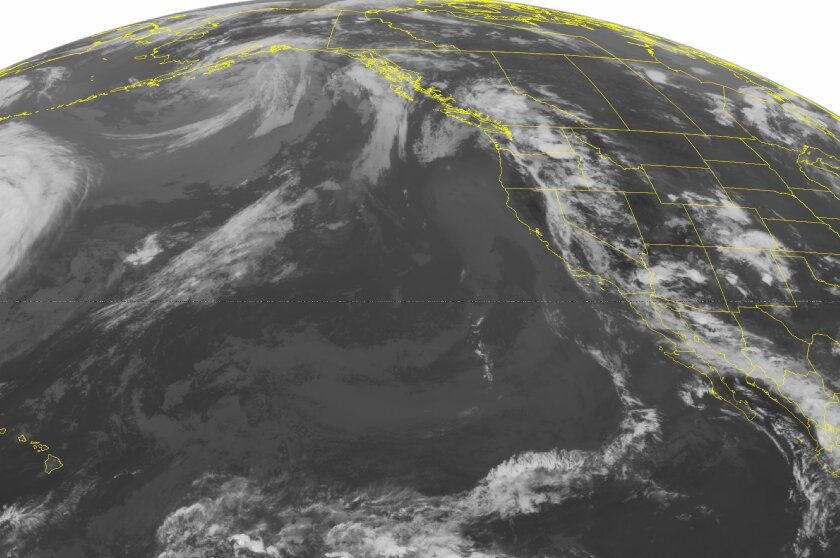 This NOAA satellite image taken Monday shows a ridge of high pressure over the western United States producing clear skies throughout the northern Rockies and central Plains. Underneath the ridge is a surface trough along the California coast. This is producing areas of cloudiness and showers from Southern California to the Pacific Northwest.