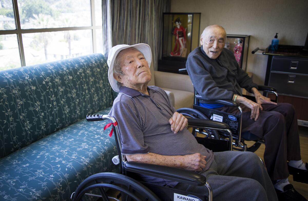 The Kawano brothers -- Yosh, 94, left, and Nobe, 93 -- were longtime clubhouse managers for the Cubs and Dodgers, respectively, and now live in the same retirement home in Los Angeles.