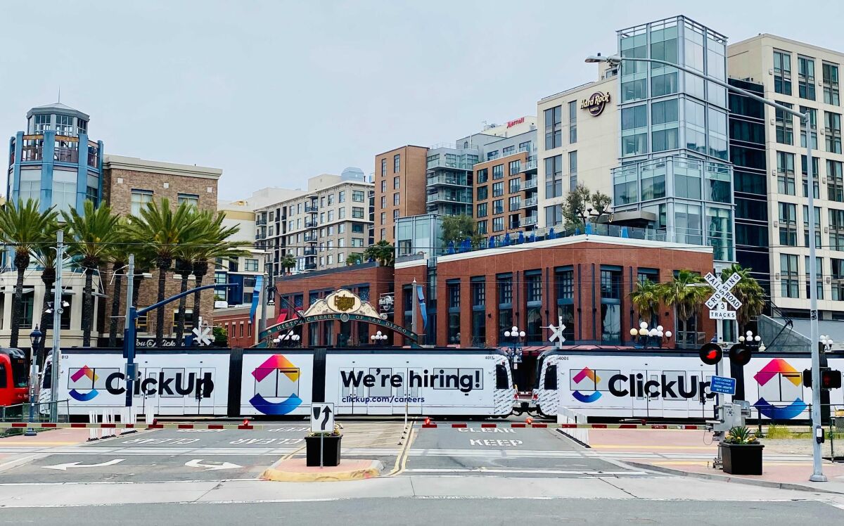 ClickUp ads on Trolley cars in San Diego