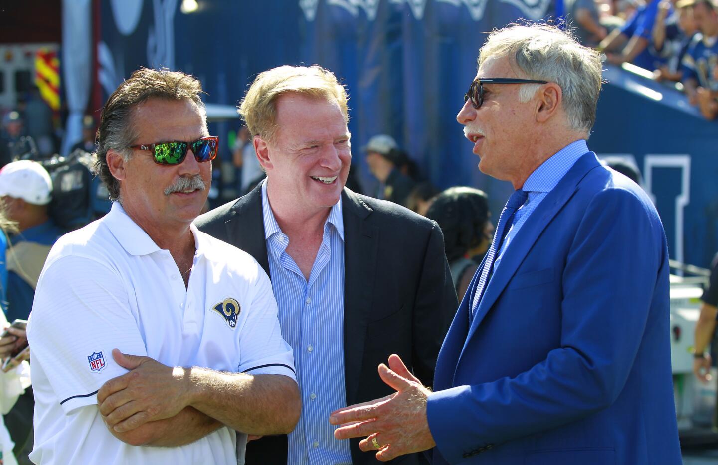 Rams Coach Jeff Fisher, NFL Commissioner Roger Goodell and Rams owner Stan Kroenke talk beforethe game.