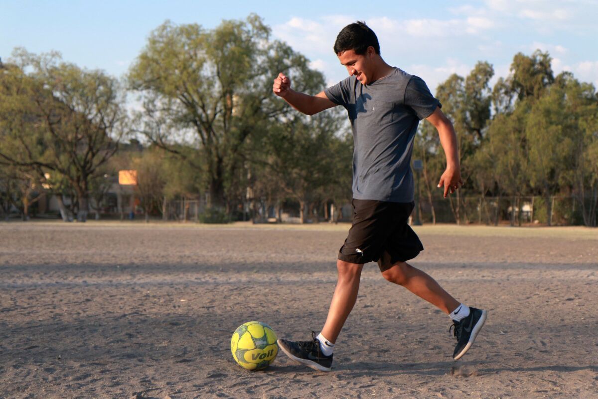 Dany Pulido dribbles a soccer ball outside Queretaro, Mexico.