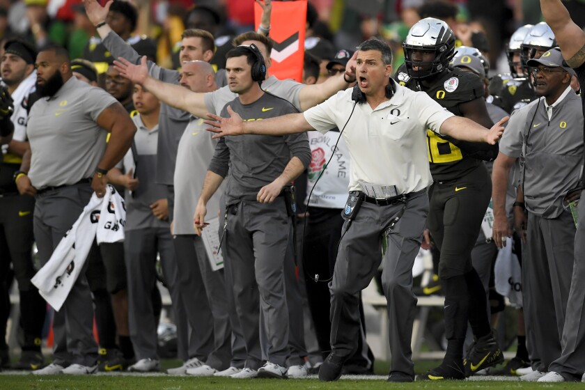 Oregon head coach Mario Cristobal reacts during second half of the Rose Bowl NCAA college football game against Wisconsin Wednesday, Jan. 1, 2020, in Pasadena, Calif. (AP Photo/Mark J. Terrill)