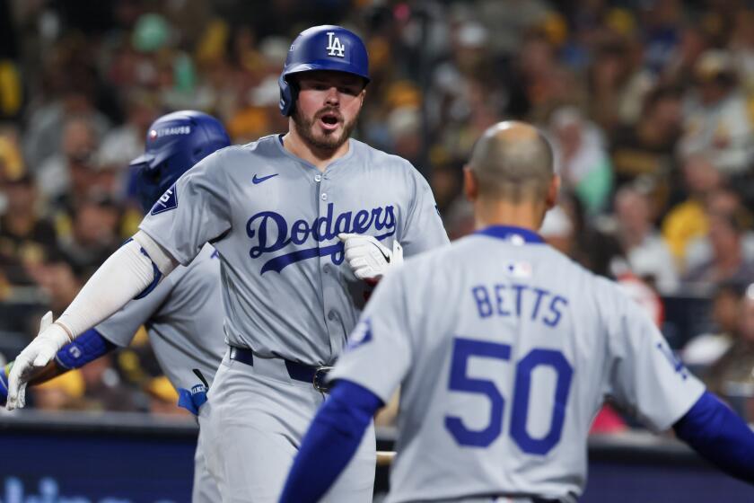 SAN DIEGO, CALIFORNIA - OCTOBER 09: Gavin Lux #9 of the Los Angeles Dodgers celebrates.