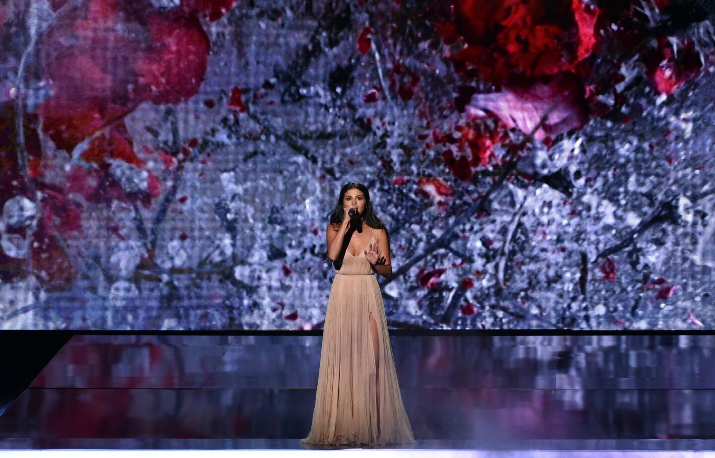 Artist-actress Selena Gomez performs.