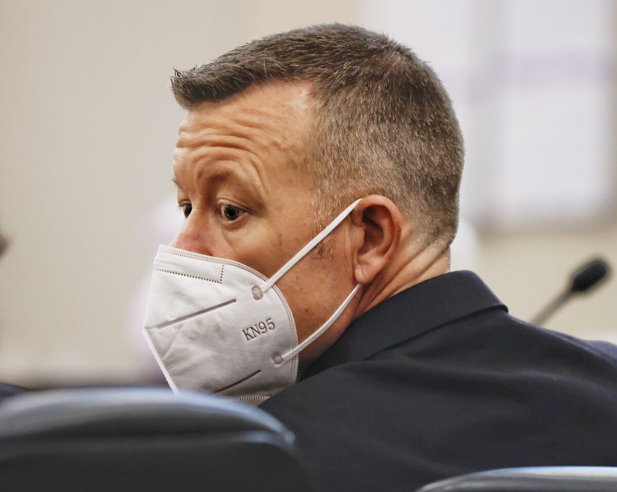 Paul Flores listens during his trial Monday