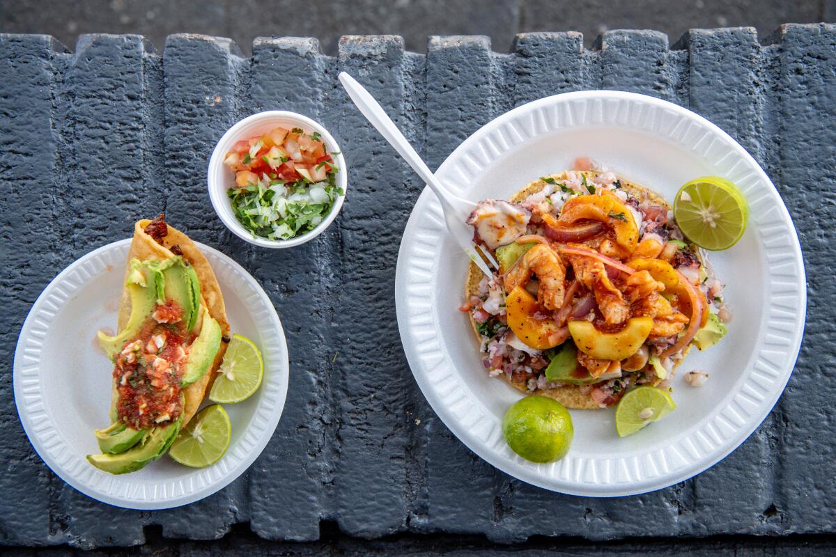 LOS ANGELES, CA- October 15, 2019: from left, Shrimp taco and the Poseidon from Mariscos Jalisco on Tuesday, October 15, 2019. (Mariah Tauger / Los Angeles Times)