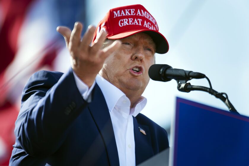 FILE - Former President Donald Trump speaks from the podium during a campaign rally, on May 1, 2022, in Greenwood, Neb. Trump must answer questions under oath in New York state's civil investigation into his business practices, a state appeals court ruled Thursday, May 26, 2022. (Kenneth Ferriera/Lincoln Journal Star via AP, File)