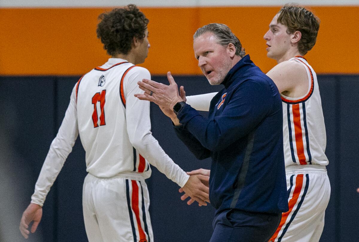 Pacifica Christian coach Jeff Berokoff cheers on his team on Thursday.