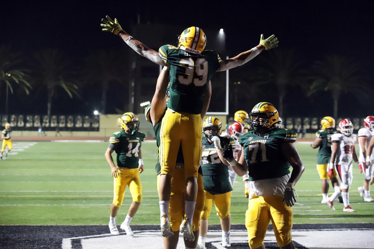 Edison running back Carter Hogue (39) celebrates after scoring a touchdown in the fourth quarter during the Chargers' win.