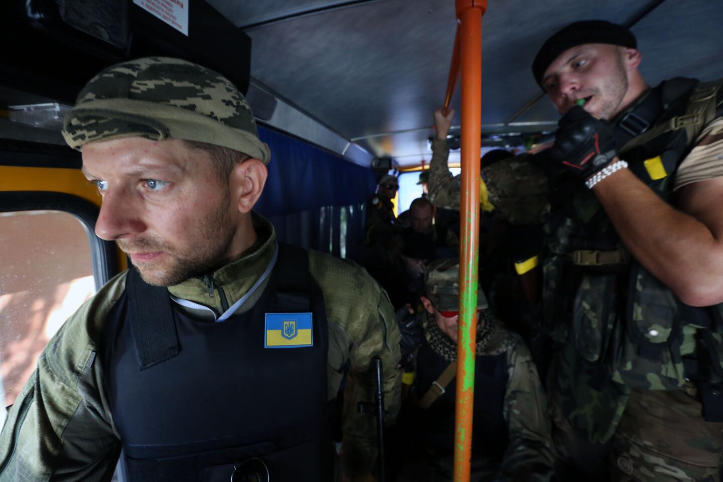A Ukrainian commando unit heads back to base after a mopping-up raid in Slovyansk.
