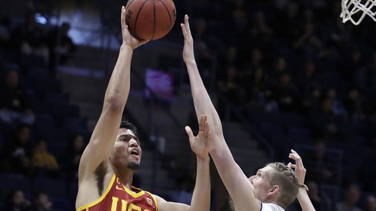 USC's Bennie Boatwright shoots against California's Connor Vanover during the first half on Saturday.