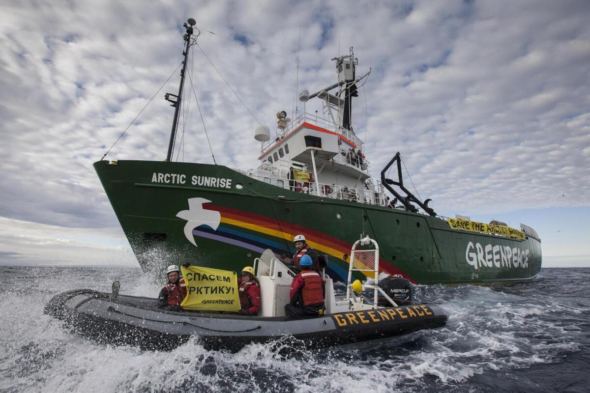 The Greenpeace ship Arctic Sunrise enters the northern sea route off Russia's coastline in August to protest Arctic oil drilling.