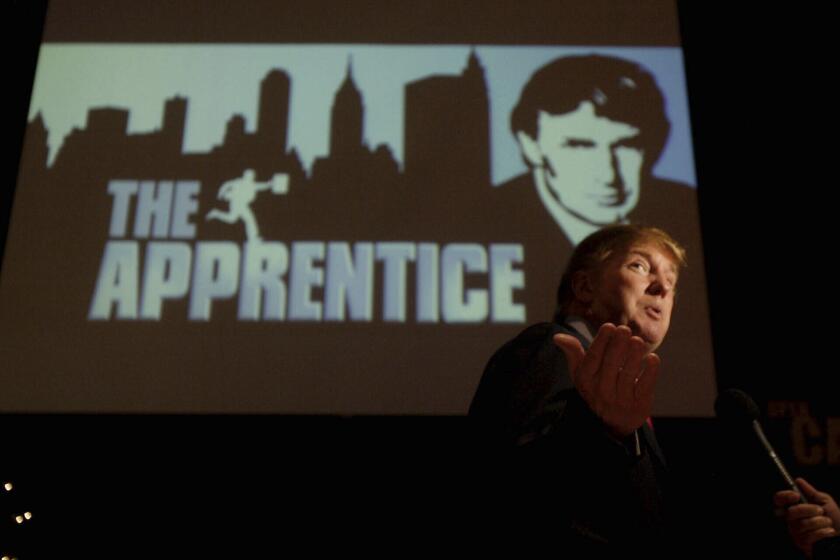 FILE - Donald Trump, seeking contestants for "The Apprentice" television show, is interviewed at Universal Studios Hollywood Friday, July 9, 2004, in the Universal City section of Los Angeles. Trump was casting for "The Apprentice" the third season. A producer's new account of Trump's behavior on "The Apprentice" is resurfacing allegations about whether he mistreated Black people who appeared on the show. (AP Photo/Ric Francis, File)