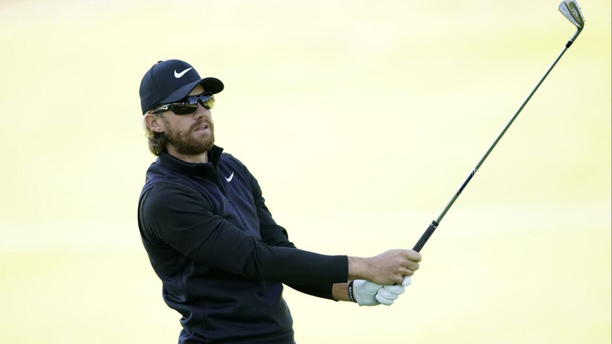 Patrick Rodgers watches his second shot on the 18th hole during second-round play in the Genesis Open golf tournament at Riviera Country Club on Saturday.