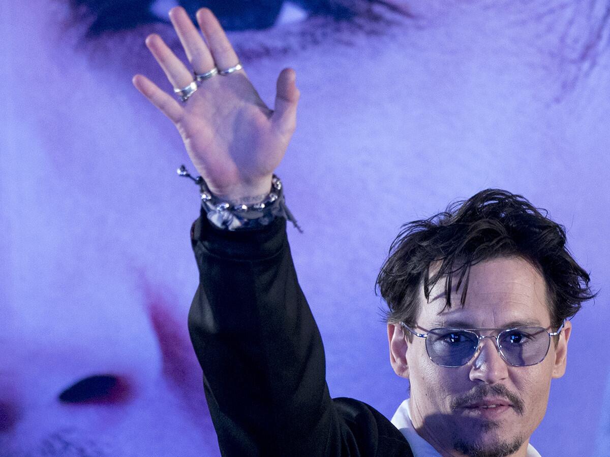 Actor Johnny Depp attends a promotional event for his new movie "Transcendence" in Beijing, China,