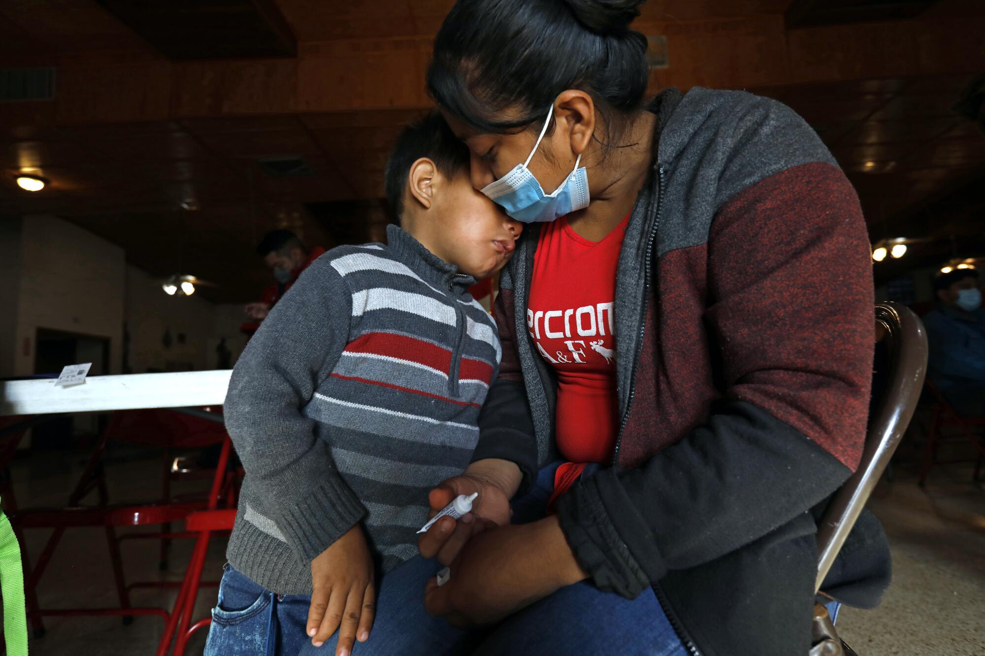 Hondurans Digna Canan Lopez and her son Eric, 5, crossed into the U.S. to seek asylum.