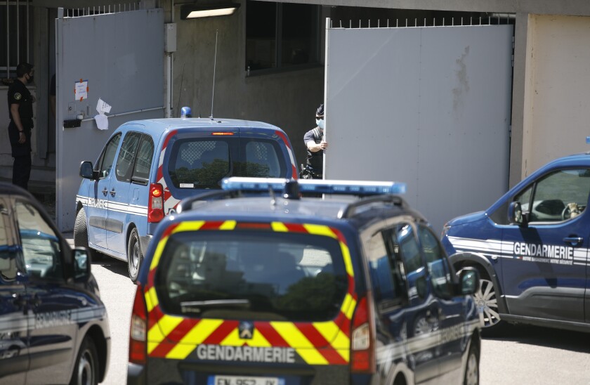 A police convoy carrying a Frenchman accused of inspiring the kidnapping of a young girl arrives at the hall of justice in Nancy, eastern France, Wednesday June 16, 2021. France had issued an Interpol arrest notice for Remy Daillet-Wiedemann, who was detained on immigration charges by Malaysia. Prosecutors accuse Daillet-Wiedemann of helping organize the abduction of an 8-year-old girl in eastern France on behalf of her mother, who had lost custody of the child. (AP Photo/Jean-Francois Badias)