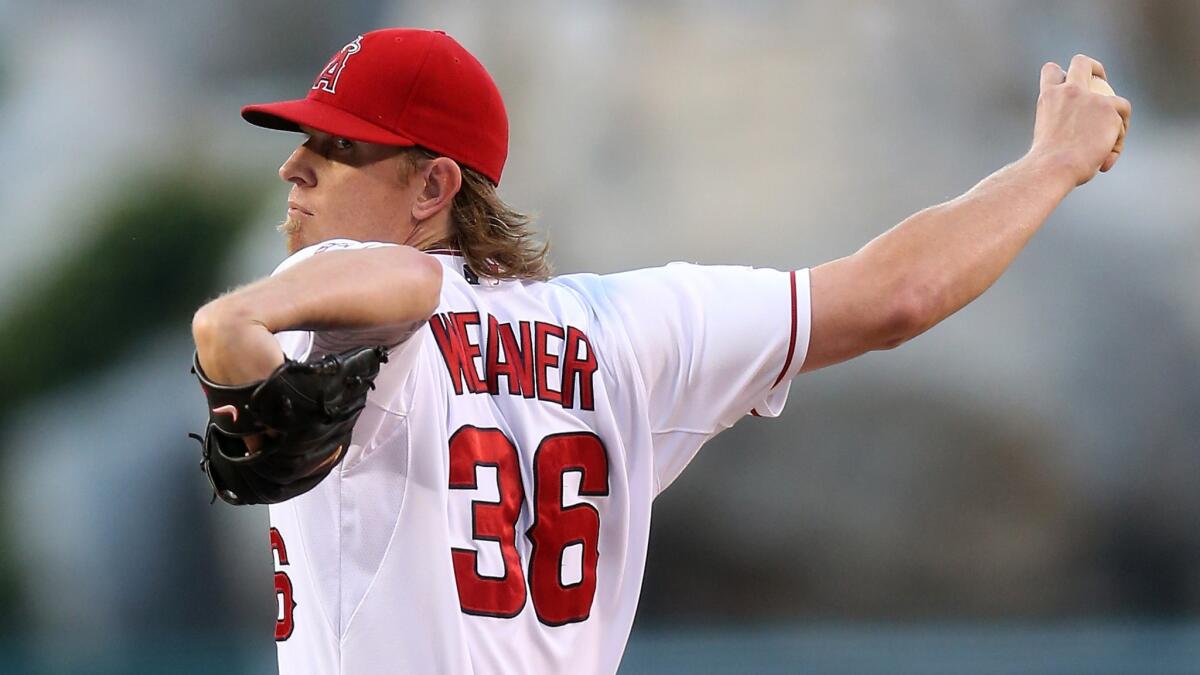 Angels starter Jered Weaver delivers a pitch during the team's 3-0 loss to the Tampa Bay Rays on Friday night.