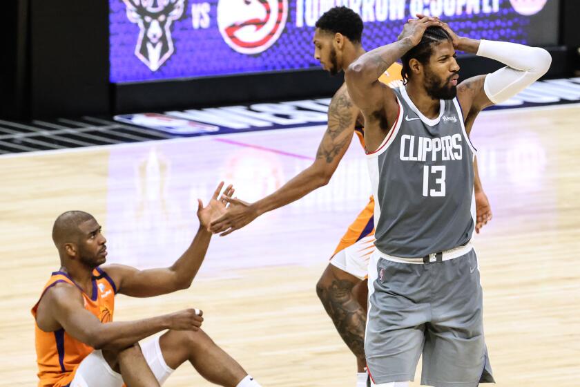 Saturday, June 26, 2021, Los Angeles CA - LA Clippers guard Paul George (13) reacts after fouling Phoenix Suns.