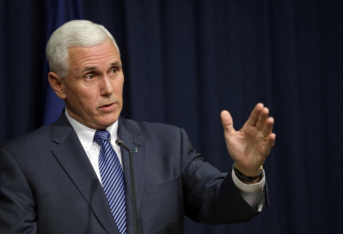 Indiana Gov. Mike Pence, who signed a law that supporters said protects religious freedom but opponents say discriminates against gay people.