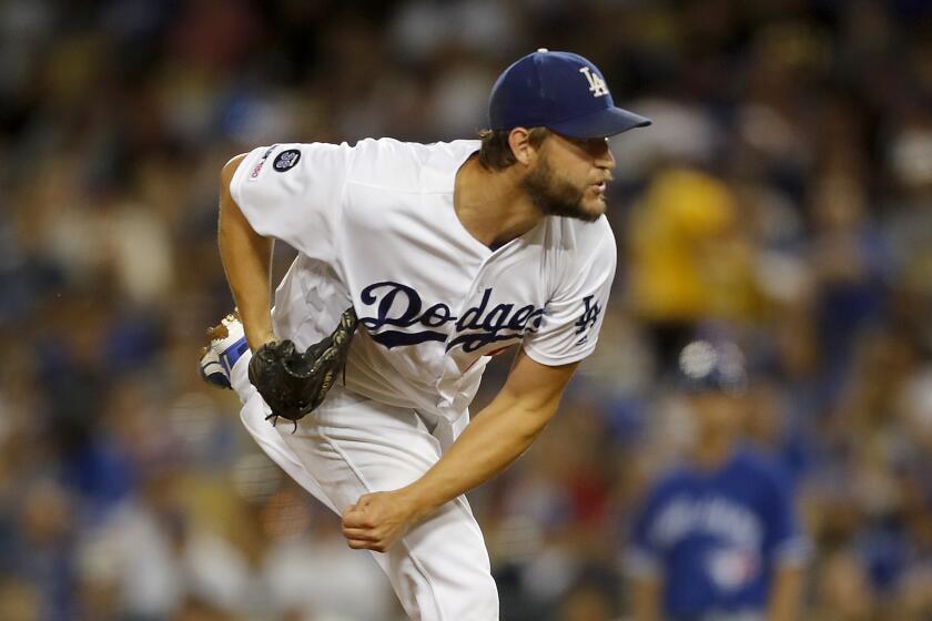 LOS ANGELES, CALIF. - AUG. 20, 2019. Dodgers ace Clayton Kershaw delivers a pitch against the Blue Jays in the fifth inning Tuesday night, Aug. 20, 2019, at Dodger Stadium in Los Angeles. (Luis Sinco/Los Angeles Times)