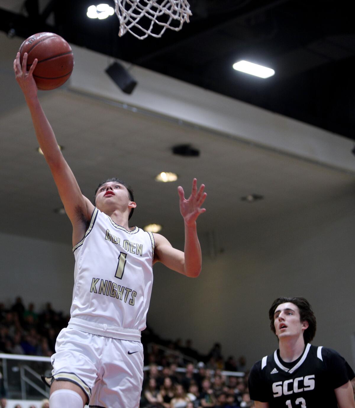 St. Francis player Fred Harper gets away from the defense and scores in the CIF SS Div. 2AA Basketball Finals vs. Santa Clarita Christian, at Azusa Pacific University in Azusa on Saturday, Feb.29, 2020. SFHS came up short 61-39.