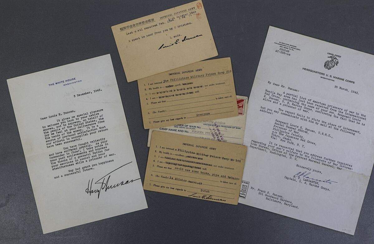 Letters, telegrams and postcards sent during Louis Duncan's imprisonment in Japanese POW camps during World War II.  