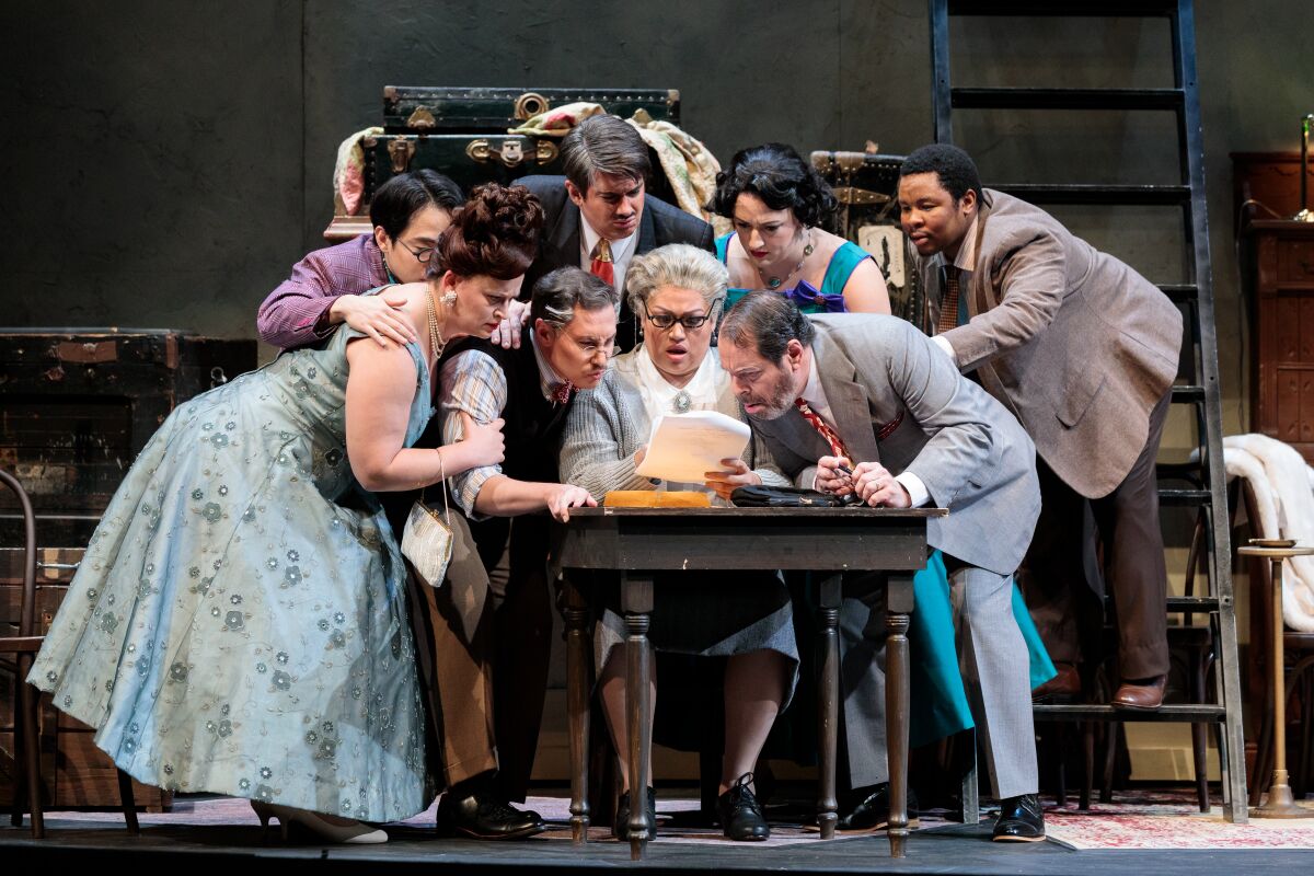 The ensemble cast read the will in "Gianni Schicchi," half of San Diego Opera's "Puccini Duo."