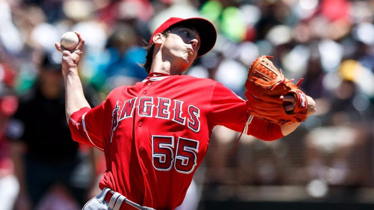 Tim Lincecum pitches against the Athletics in his Angels debut on June 18.