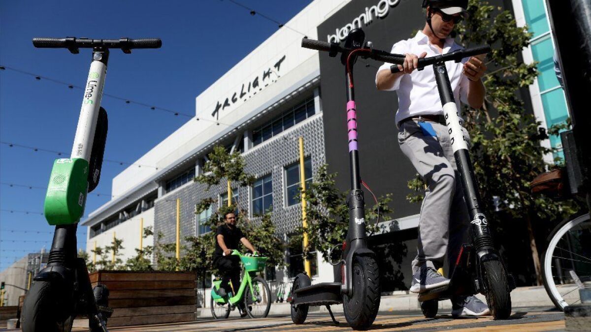 Lyft and Uber are rolling out electric scooters to compete with existing players Lime and Bird.
