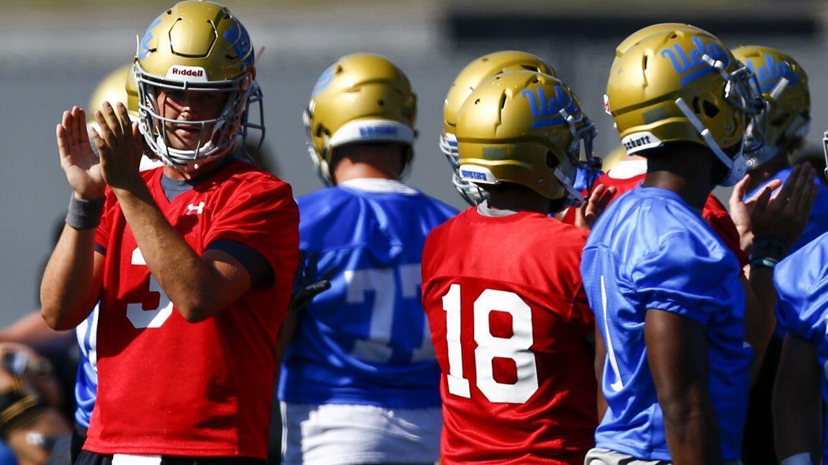 UCLA quarterback Wilton Speight (3) claps during the first day of fall camp at UCLA's Wasserman Football Center on Aug. 3.
