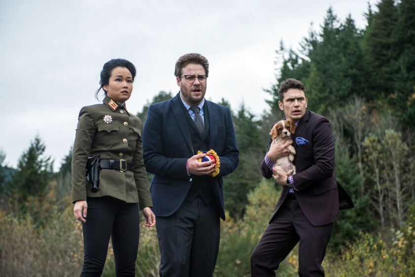 Diana Bang as Sook, Seth Rogen as Aaron, and James Franco as Dave in Columbia Pictures' "The Interview."