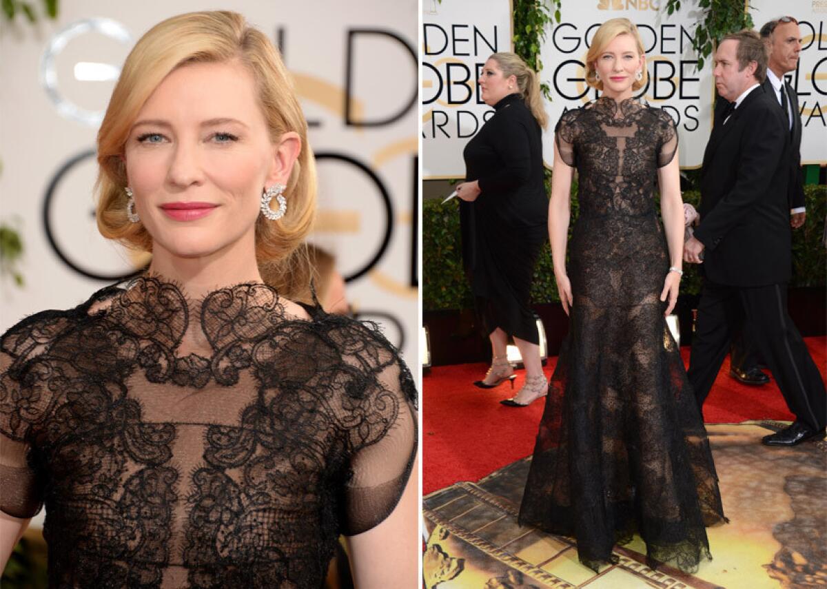 Actress Cate Blanchett wears a black lace Armani Prive gown.
