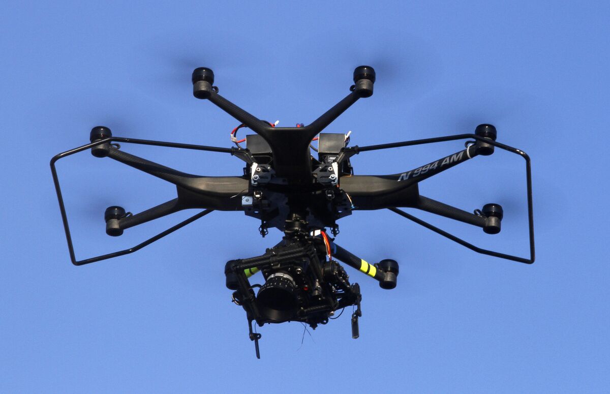 A drone with a camera is used to shoot scenes for a television show in Santa Clarita in September. The L.A. City Council approved an ordinance Wednesday that criminalizes violating FAA drone regulations.