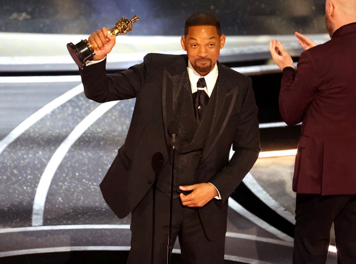 Will Smith accepts the award for Best Actor during the Oscars on March 27. 
