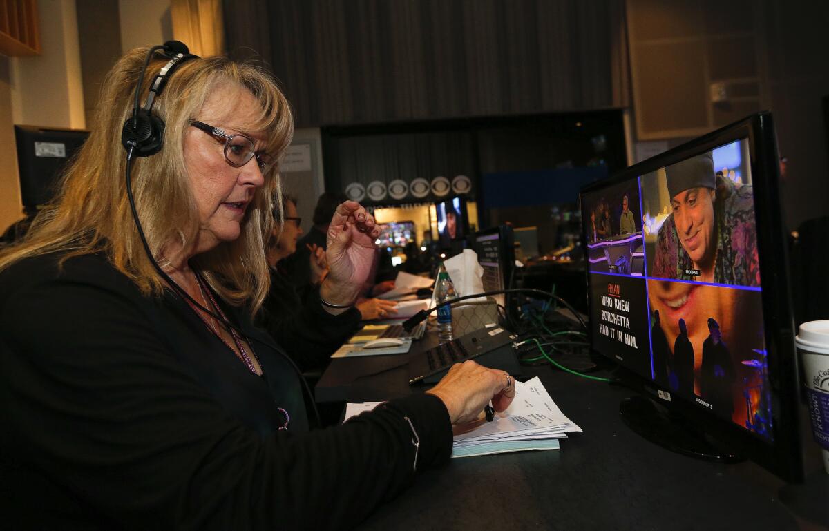 Executive producer Trish Kinane works inside the control room during a dress rehearsal for the March 24 episode of "American Idol."